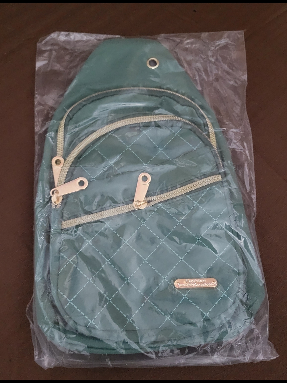 Quilted Light Green Crossbody Sling Bag with Gold Accents